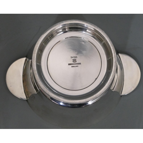 274 - An oval silver plated 2-handled entree dish with cover enclosing liner, a silver plated muffin dish ... 