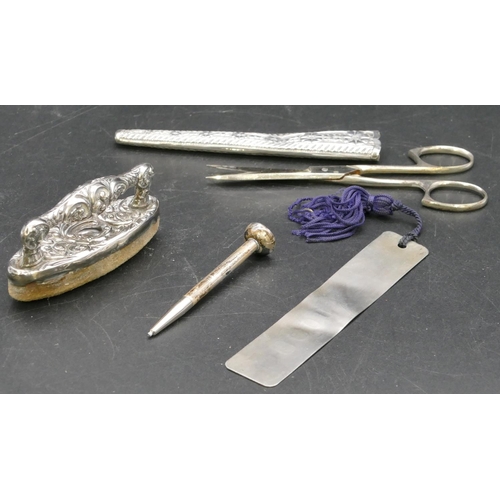 277 - A Birmingham silver nail buff, a Birmingham silver scissor case with embossed decoration, a modern B... 