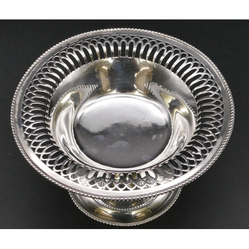 285 - A London silver round sweetmeat dish with pierced rim and sweeping base, 4.8oz, 16cm diameter.