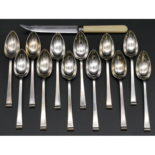 289 - A set of 12 silver grapefruit spoons (with plated knife) in fitted brown leather case, makers mark C... 