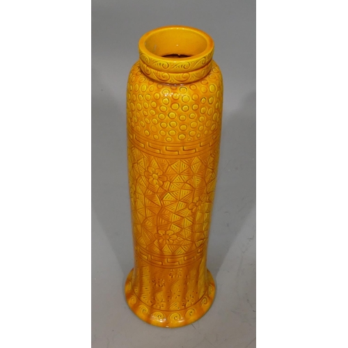 29 - A Burmantofts yellow cylindrical thin necked vase with floral decoration, stamped 1397, 42cm high.