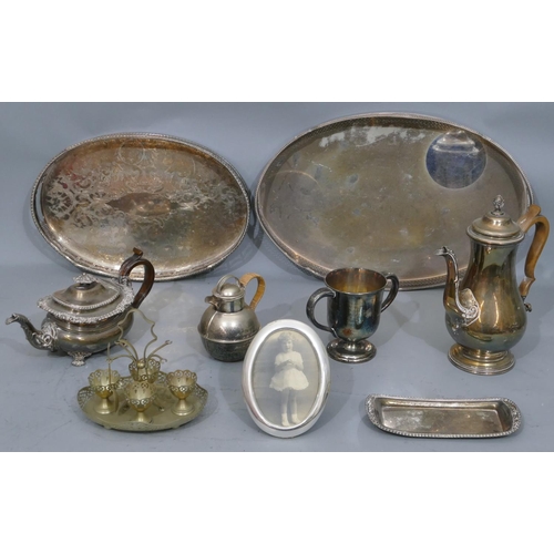 296 - A silver plated round bulbous shaped teapot, another plated teapot, 2 oval plated trays and a small ... 