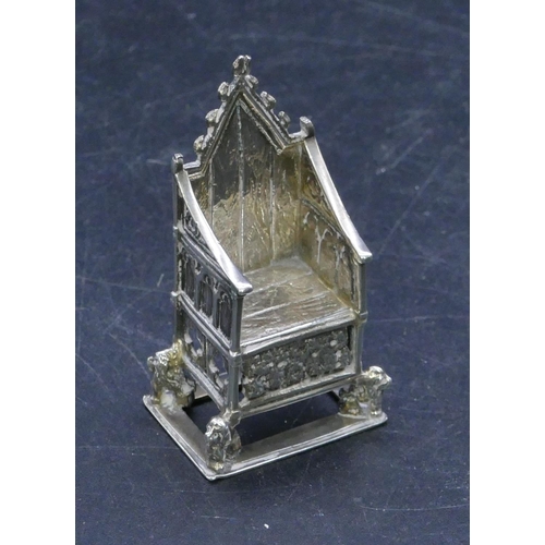 302 - An Edward VII silver miniature throne chair, London 1901, makers mark CSFS, 5.5cm high, 0.70oz.