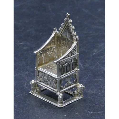 302 - An Edward VII silver miniature throne chair, London 1901, makers mark CSFS, 5.5cm high, 0.70oz.