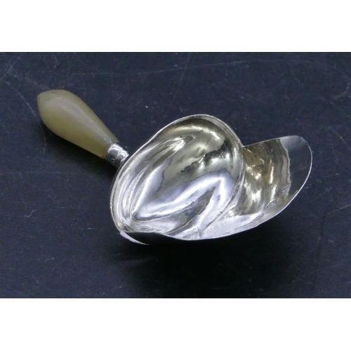 304 - A George III silver caddy spoon with Mother of Pearl handle and shovel shaped bowl, Birmingham 1811,... 