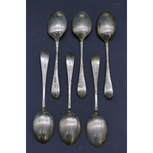 308 - A set of 6 Sheffield silver coffee spoons, makers mark HA, in fitted black leather case, 1.6oz.