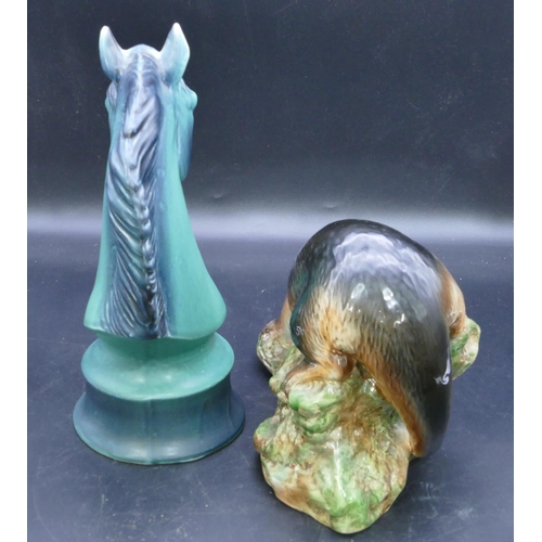 31 - A Sylvac figurehead of a horses head on green ground, 28.5cm high and a Sylvac figure of an otter, 2... 