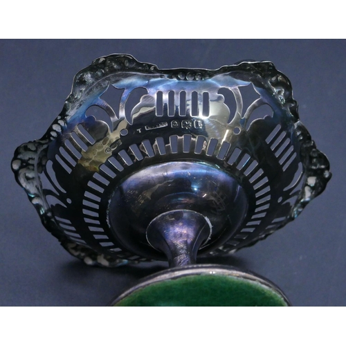 312 - A Birmingham silver scallop shaped small sweetmeat dish with embossed and pierced decoration on roun... 