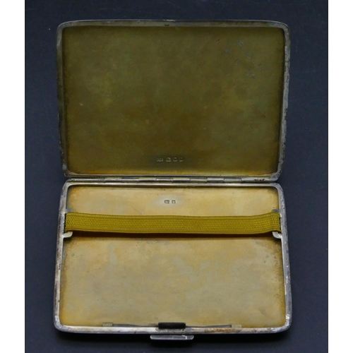 316 - A London silver cigarette case with engine turn decoration with hinged front, 8.3cm wide closed, 4.4... 