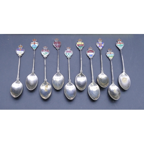 319 - A set of 10 Canadian sterling silver souvenir teaspoons with enamelled crest motifs, boxed, 2.9oz gr... 