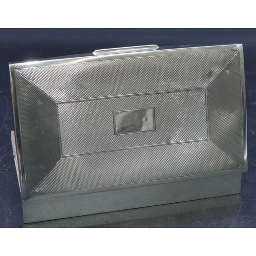 323 - A Birmingham silver rectangular shaped cigarette box with engine turned hinged lid, makers mark R.Br... 