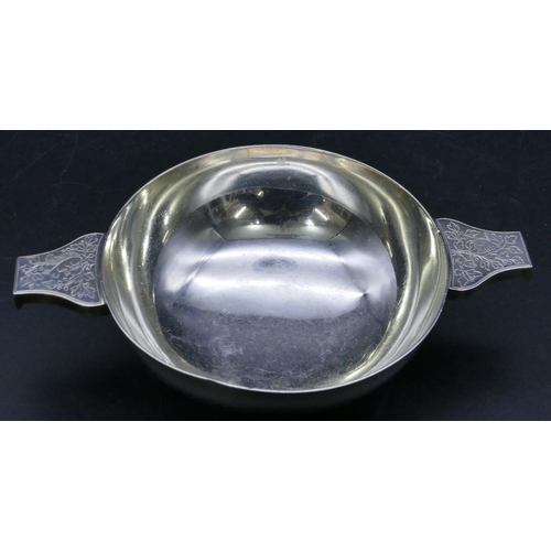 327 - A George V silver round 2-handled porringer with engraved branch and leaf decoration, London 1929, m... 