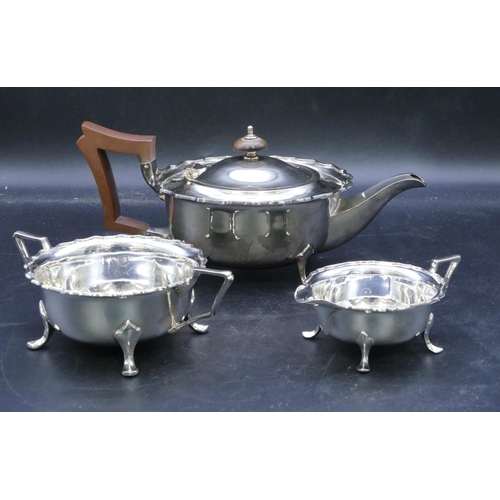 329 - A George V 3-piece round bulbous shaped tea service with crinkled rims on splayed feet, 1 teapot wit... 