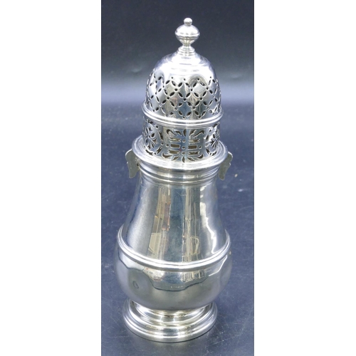 330 - A George V silver round bulbous shaped large sugar caster on sweeping foot, London 1912, makers mark... 