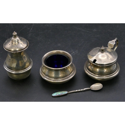 336 - A 3-piece Birmingham silver round bulbous shaped condiment set, mustard pot with hinged lid enclosin... 