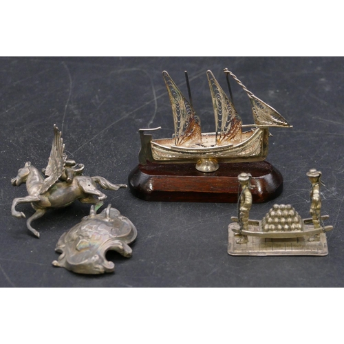 337 - A Sterling silver small model of a ship on hardwood stand and 2 other silver coloured metal small gr... 