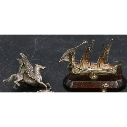 337 - A Sterling silver small model of a ship on hardwood stand and 2 other silver coloured metal small gr... 