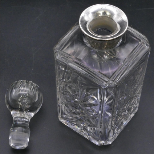 341 - A square cut glass decanter with stopper with Birmingham silver neck, engraved 1950/75, 26.5cm high.