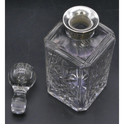 341 - A square cut glass decanter with stopper with Birmingham silver neck, engraved 1950/75, 26.5cm high.