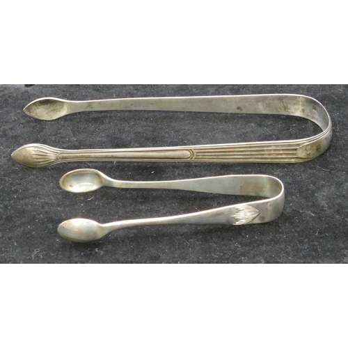 351 - A pair of George III silver sugar tongs with reeded decoration and a pair of Sheffield silver sugar ... 