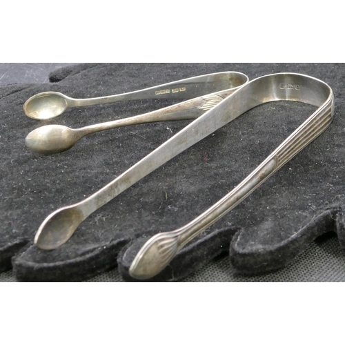 351 - A pair of George III silver sugar tongs with reeded decoration and a pair of Sheffield silver sugar ... 