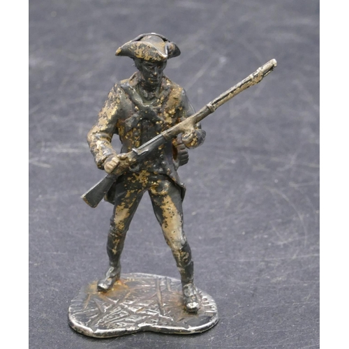 358 - A London silver miniature figure of a military gentleman, 1.4oz, 6cm high.