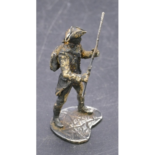 358 - A London silver miniature figure of a military gentleman, 1.4oz, 6cm high.