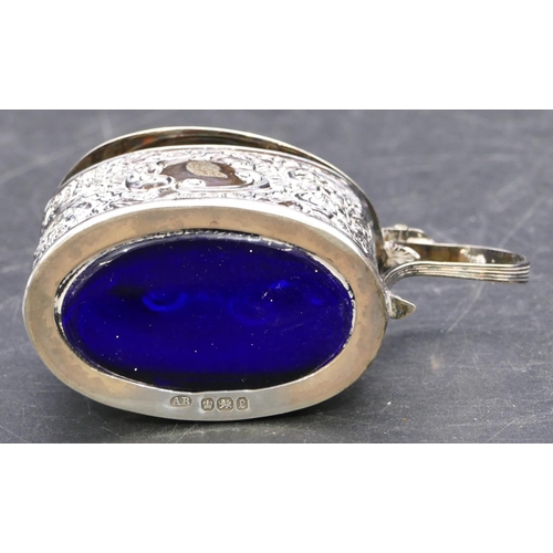 360 - A London silver boat shaped salt with blue glass liner on oval sweeping base and a Sheffield silver ... 