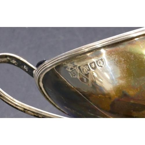 360 - A London silver boat shaped salt with blue glass liner on oval sweeping base and a Sheffield silver ... 