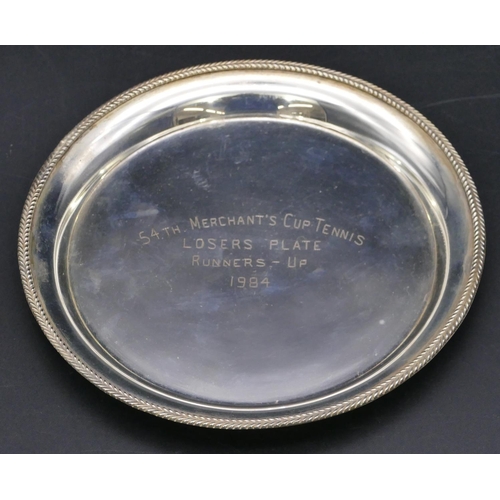 375 - A Continental silver coloured round card tray engraved 