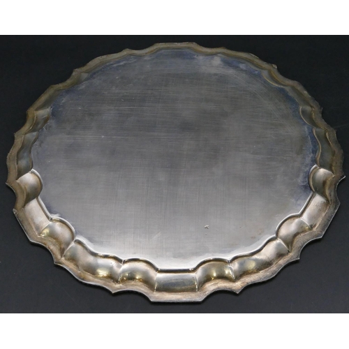 380 - A Continental silver coloured metal round pie crust salver with engraved description to center, 26.5... 