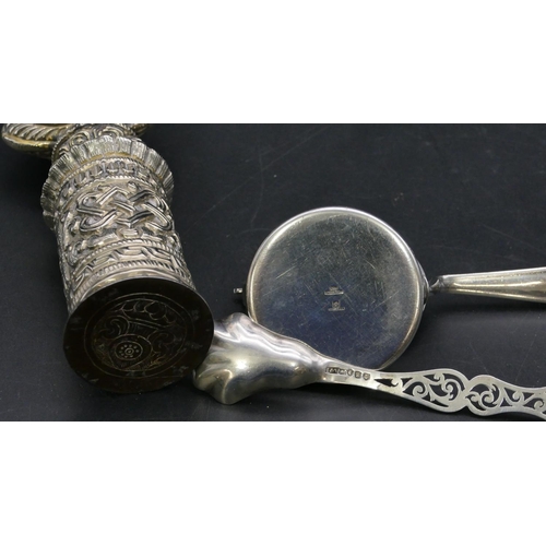 383 - A Victorian Birmingham silver jam spoon with shell shaped bowl with pierced handled, an Eastern silv... 