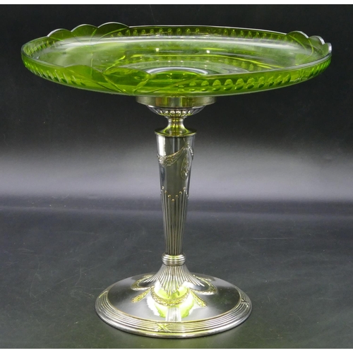 385 - A silver plated and green glass round comport with raised swag decoration and sweeping base, 26.5cm ... 