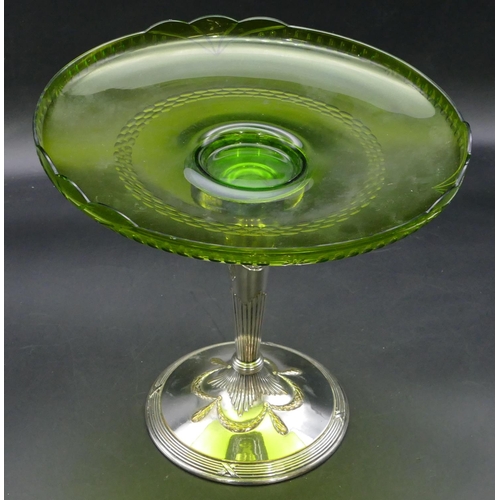 385 - A silver plated and green glass round comport with raised swag decoration and sweeping base, 26.5cm ... 