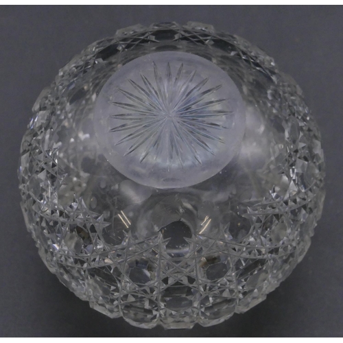 393 - An Edward VII cut glass round bulbous shaped scent bottle with silver screw lid with embossed floral... 