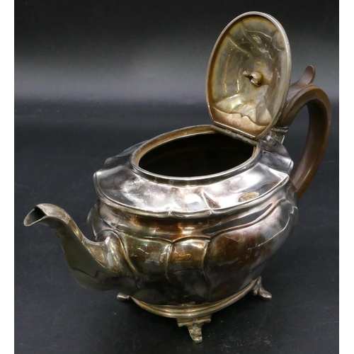 395 - A late Victorian oval silver teapot with wooden handle and finial on splayed feet, London, 1900, 22.... 