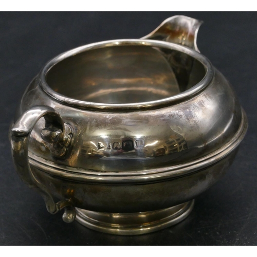 398 - A 3-piece George V silver round bulbous shaped tea service, comprising of teapot with wooden handle,... 