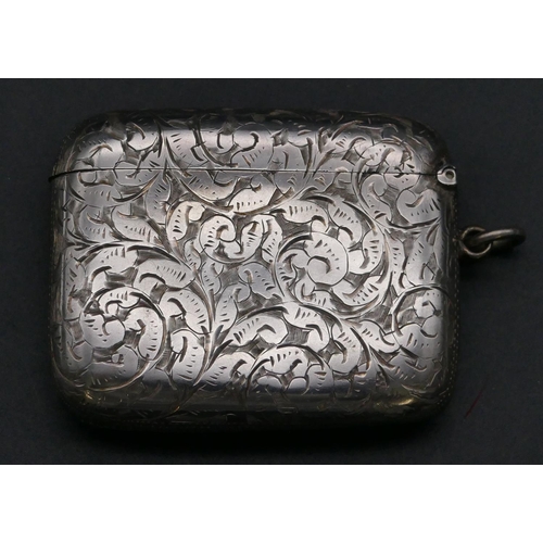 405 - A Victorian silver large vesta case with allover chased floral and scroll decoration, hinged lid, Bi... 