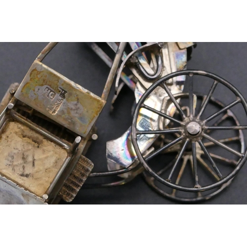 412 - A Chinese silver coloured metal small model of a carry chair (makers mark HC), a similar Chinese sil... 