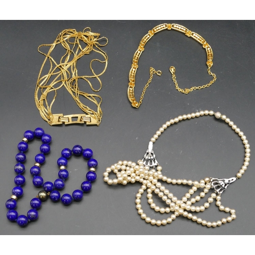 421 - A lapis lazuli and 925 silver gilt choker necklace, a Monet 7 strung necklace and 2 other necklaces.... 