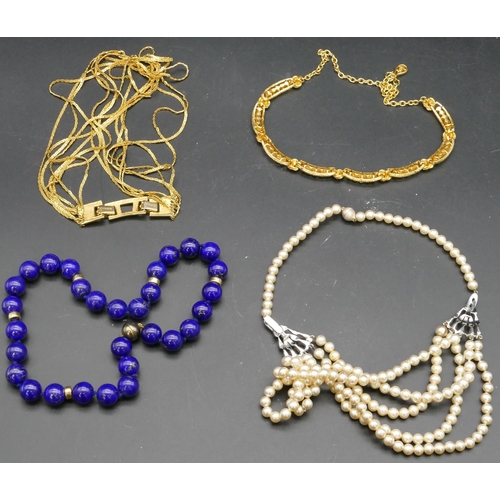 421 - A lapis lazuli and 925 silver gilt choker necklace, a Monet 7 strung necklace and 2 other necklaces.... 