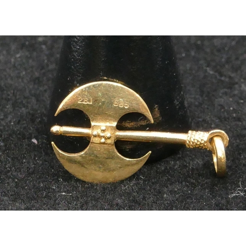 426 - A 14ct gold pendant in the form of double headed axe, 2.7 grams.