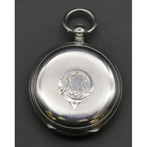 427 - A Tumpowski, Birmingham, large London silver open faced pocket watch with white enamel dial and seco... 