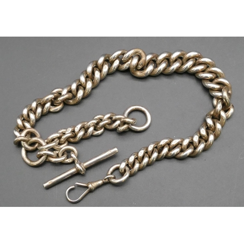 428 - An extremely large and heavy silver linked watch chain with T-bar, 52cm long, 344 grams.