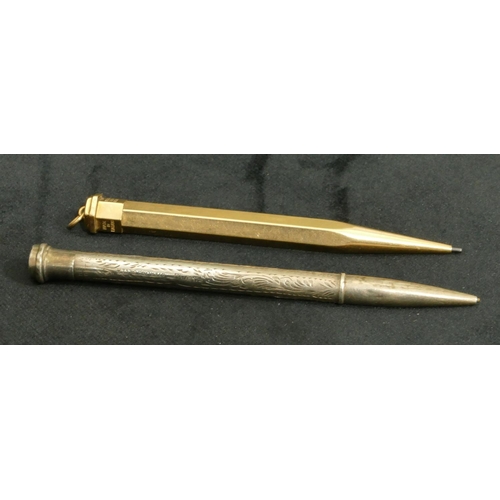 435 - A Sterling silver propelling pencil with engraved decoration and a gold plated hexagonal propelling ... 