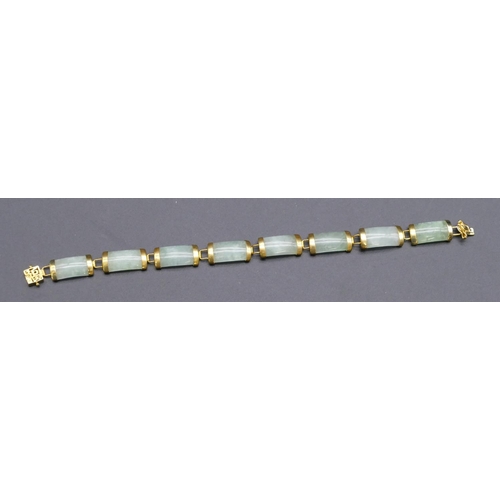 449 - An Oriental jade style panel bracelet, 19.5cm long.