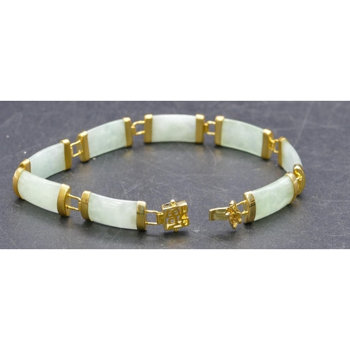 449 - An Oriental jade style panel bracelet, 19.5cm long.