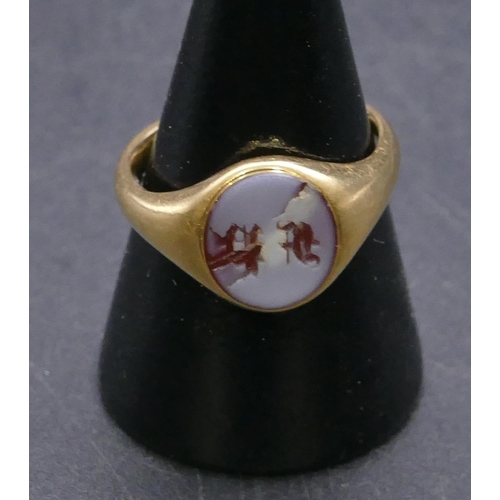 456 - A high carat gold signet ring mounted with red seal to top depicting monogram, makers mark R.N.W. , ... 