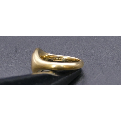 456 - A high carat gold signet ring mounted with red seal to top depicting monogram, makers mark R.N.W. , ... 