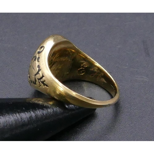 457 - A high carat gold 19th Century mourning ring with black enamel decoration (part worn), panel hinged ... 